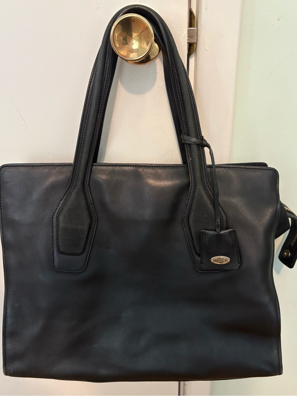 Authentic Tod’s black leather tote bag